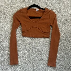 Extra small long sleeve. Orange brown color. Garage brand. Good condition.